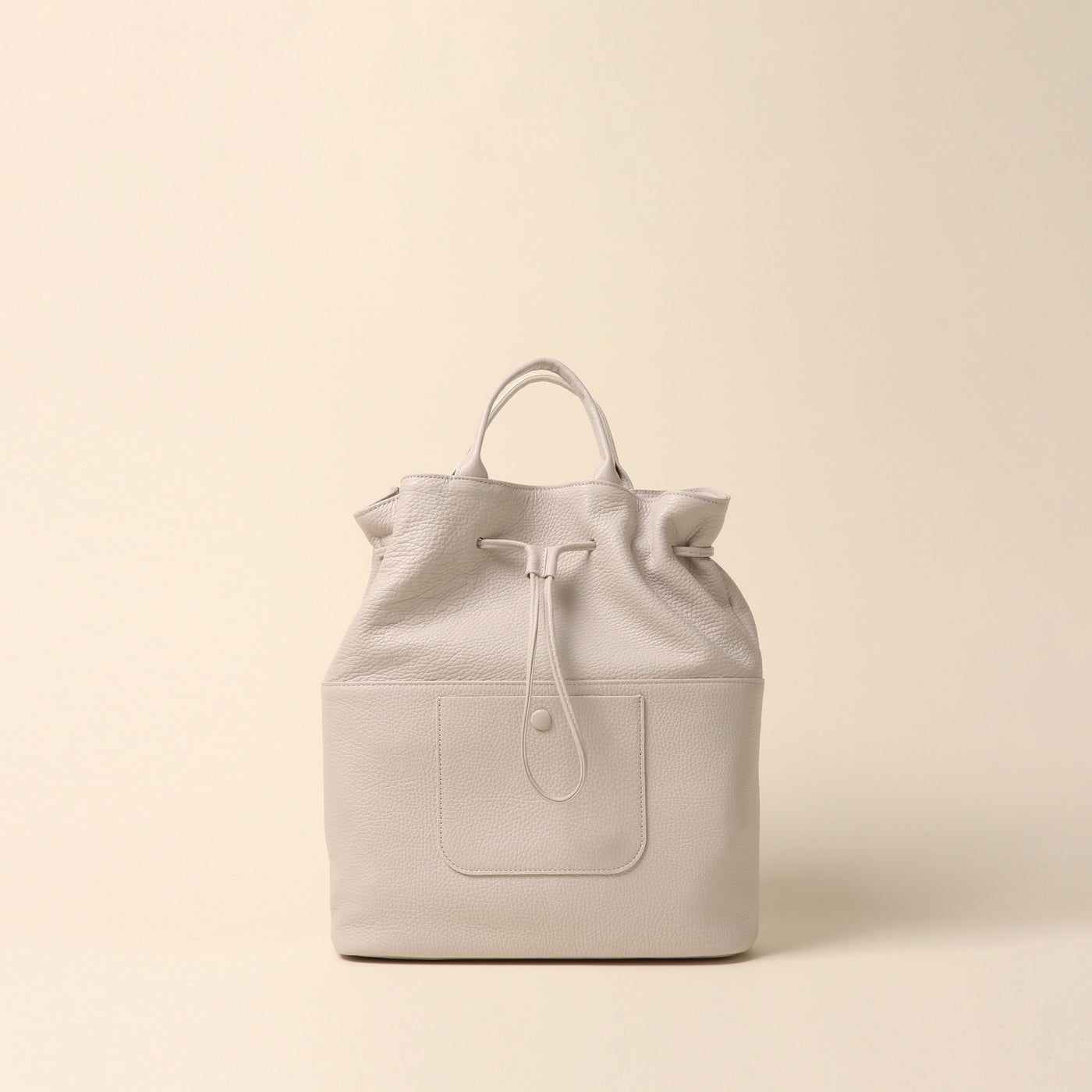 <itten-itten> Drawstring tote/warm beige