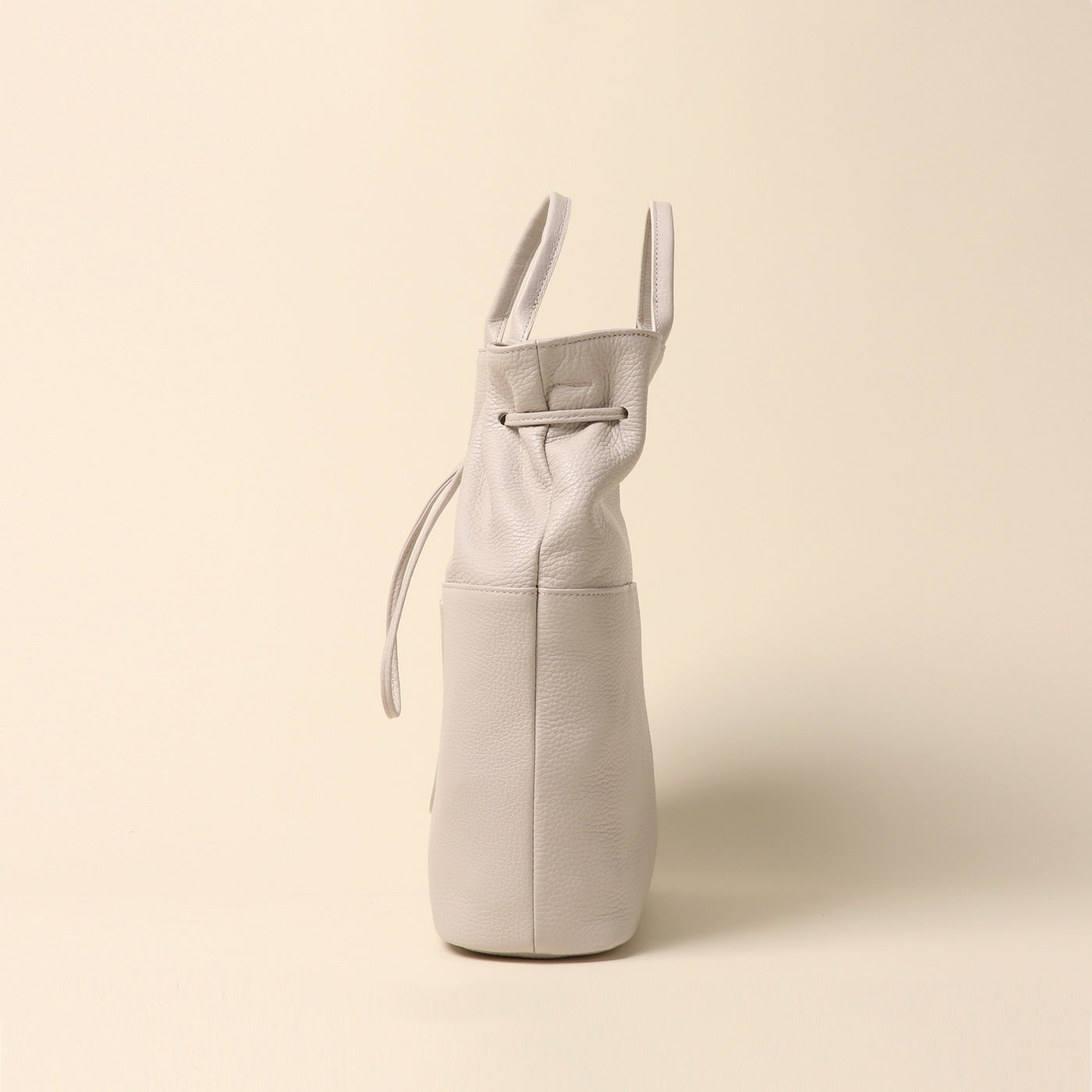 <itten-itten> Drawstring tote/warm beige