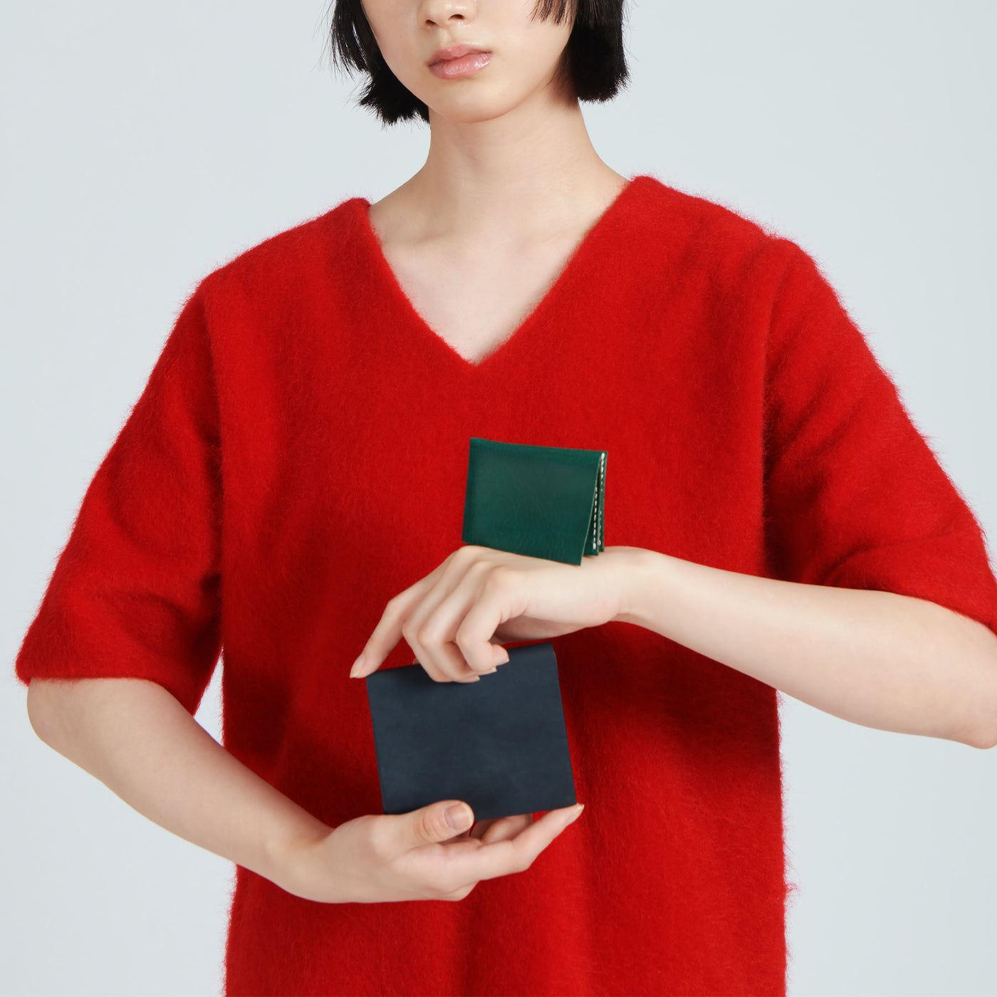 <Mojakawa> kumi S coin purse / orange